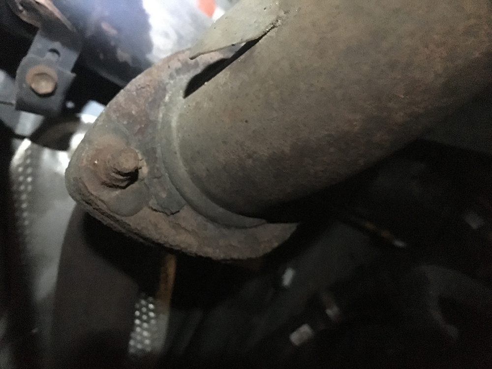 Unbolt the Tailpipe from the Muffler Assembly