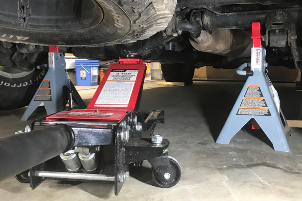 Place Blocks Under Tires - RCI Lower Link Skid Plate Install