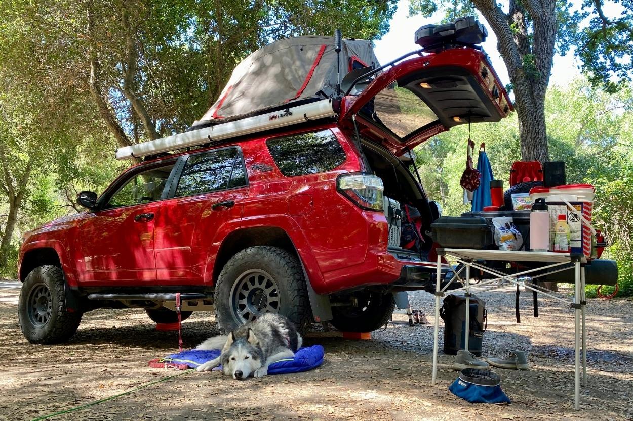 4runner trd off road Rigd Supply Ultraswing with Front Runner Table KingCamp aluminum roll up table Camco bamboo folding table YETI Hopper Flip 18 soft cooler