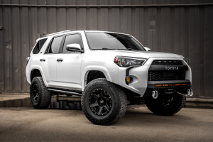 5th Gen 4Runner in Super White with Cali Raised Stealth Bumper and RockTrix RT112 Wheels