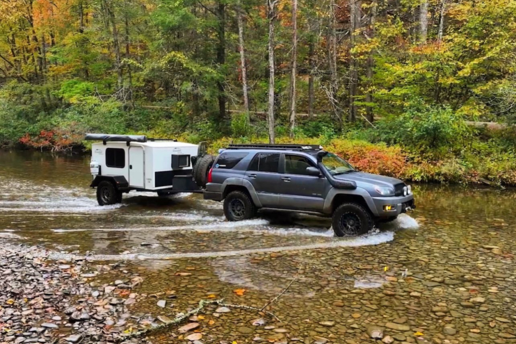 4th Gen 4Runner with camping trailer creek crossing in the North Georgia Mountains