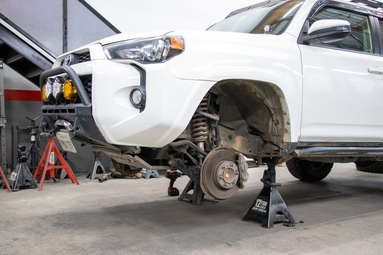 4Runner on jack stands with wheel removed