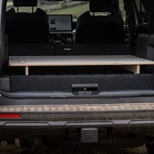 Vehicle cargo area leveled with modular platform system